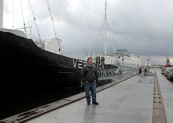 Bud Ballou poses with the ship