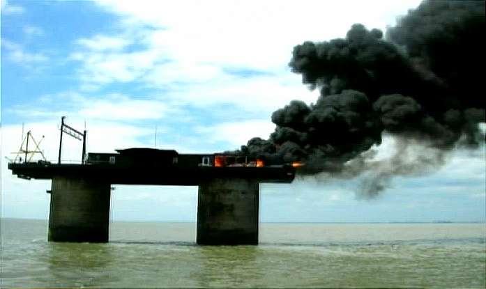 Sealand on Fire smoke & flames over the fort